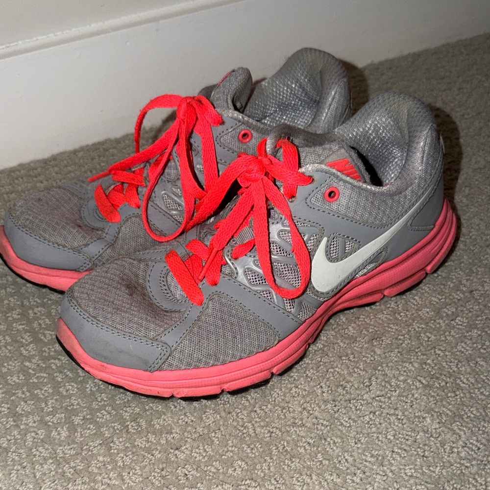 Nike Women’s Gray Athletic Shoes with Bright Pink Accents